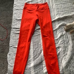 Never worn! Red Nike leggings size small